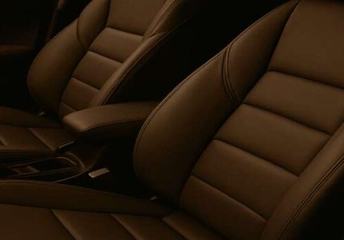 Car leather repair San Diego – restored brown driver and passenger seats