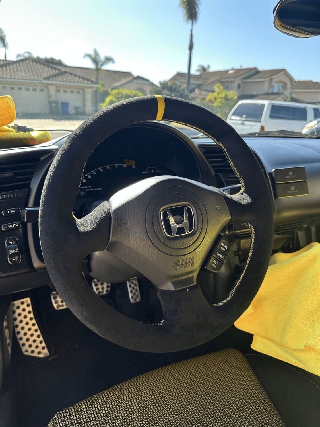 Honda S2000 steering wheel rewrap in black Alcantara with yellow stitching