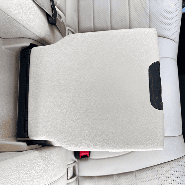 Leather car armrest after professional leather color restoration in San Diego