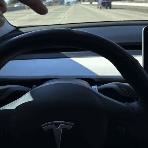 Peeling Tesla Steering Wheel1
