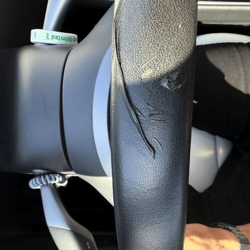Peeling Tesla Steering Wheels2