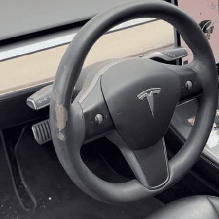 Peeling Tesla Steering Wheels7