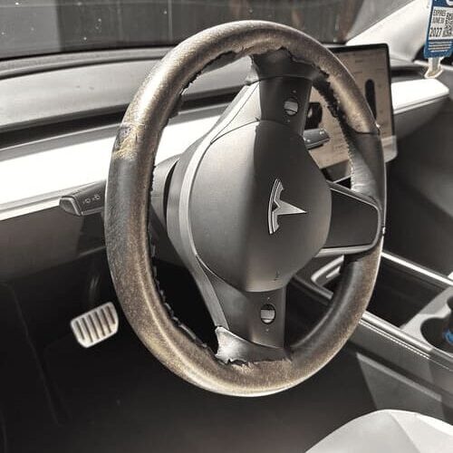 Peeling Tesla Steering Wheels8
