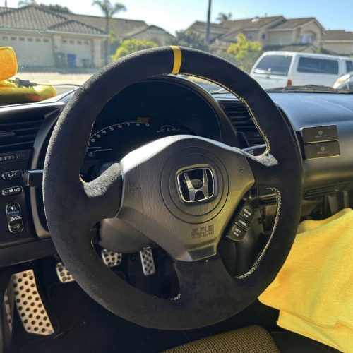 Honda S2000 steering wheel rewrap in black Alcantara with yellow stitching